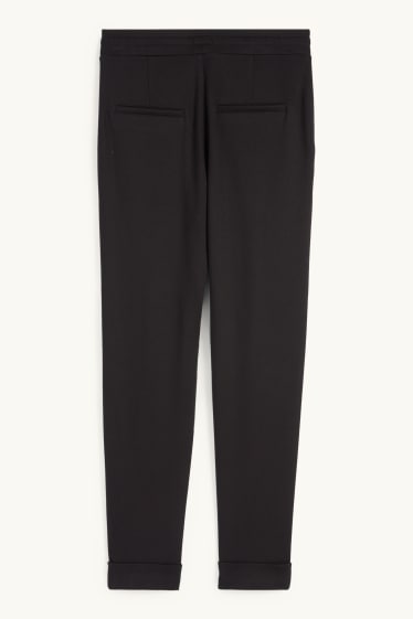 Donna - Pantaloni di jersey - vita media - tapered fit - nero