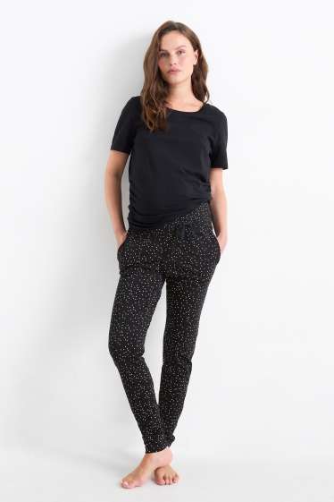 Damen - Umstands-Pyjamahose - gepunktet - schwarz