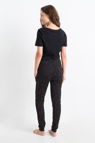 Damen - Umstands-Pyjamahose - gepunktet - schwarz