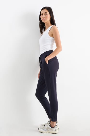 Femmes - Pantalon en jersey - mid waist - tapered fit - bleu foncé