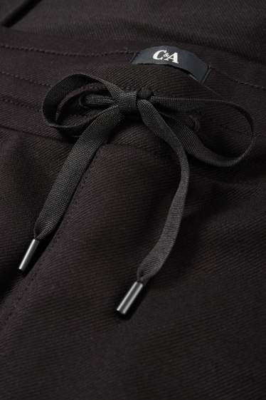 Damen - Stoffhose - Mid Waist - Tapered Fit - schwarz