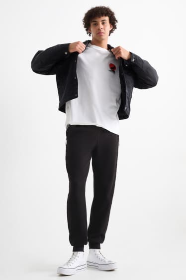 Bărbați - Pantaloni de trening - negru