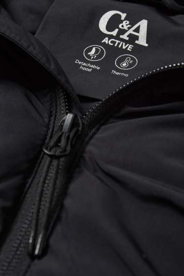 Femmes - Veste chaude de sport à capuche - noir