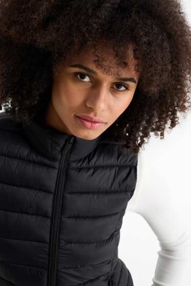 Women - Quilted gilet - black