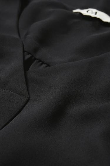 Damen - Bluse mit V-Ausschnitt - schwarz