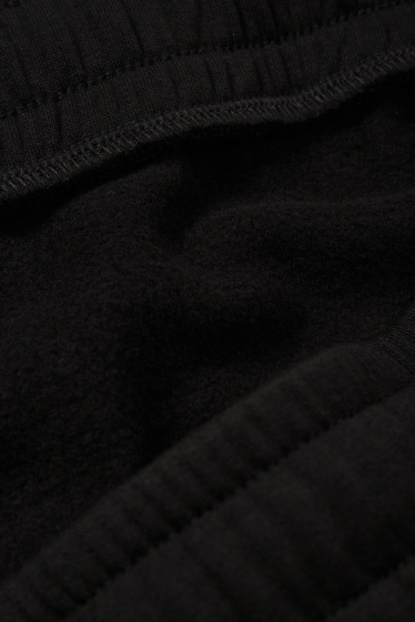 Bărbați - Pantaloni de trening - negru