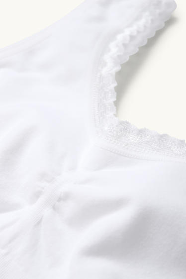 Dámské - Sportovní podprsenka - bezešvá - bílá