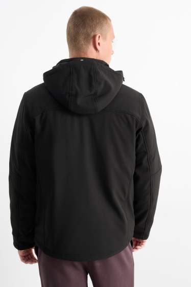 Hommes - Veste softshell à capuche - 4 Way Stretch - déperlante - noir