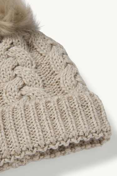 Dames - Muts met pompon - kabelpatroon - licht beige