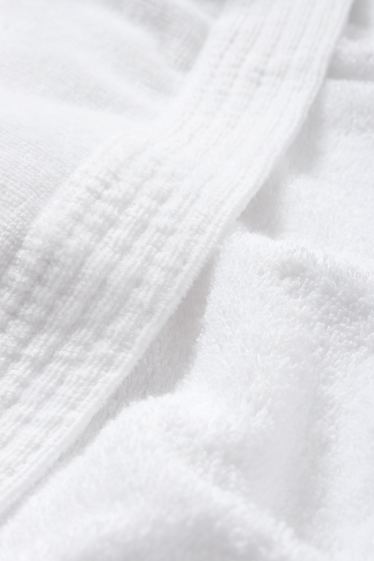 Femmes - Peignoir en éponge à capuche - blanc