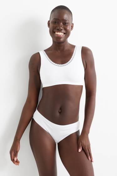 Dámské - Sportovní podprsenka - bezešvá - bílá