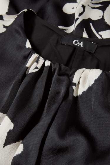 Dona - Vestit acampanat amb mànigues de fanal - de flors - negre