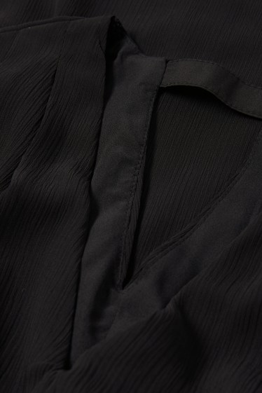Women - V-neck chiffon dress - textured - black