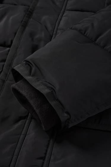 Home - Jaqueta embuatada amb caputxa - impermeable - negre