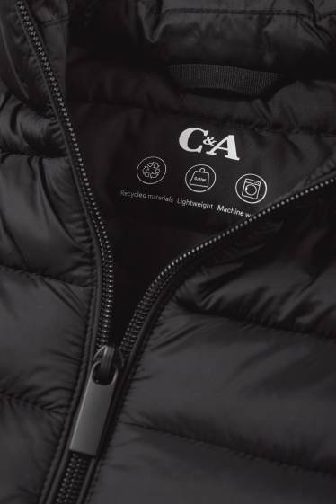 Women - Quilted gilet - black