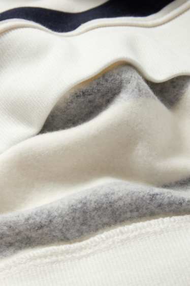 Dona - Dessuadora - de ratlles - blau/blanc