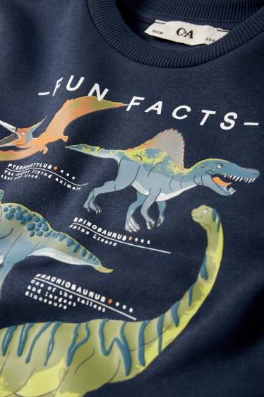 Nen - Dinosaures - dessuadora - blau fosc