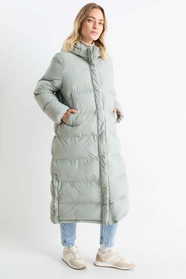 Women - Quilted coat with hood - light green