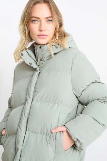 Women - Quilted coat with hood - light green