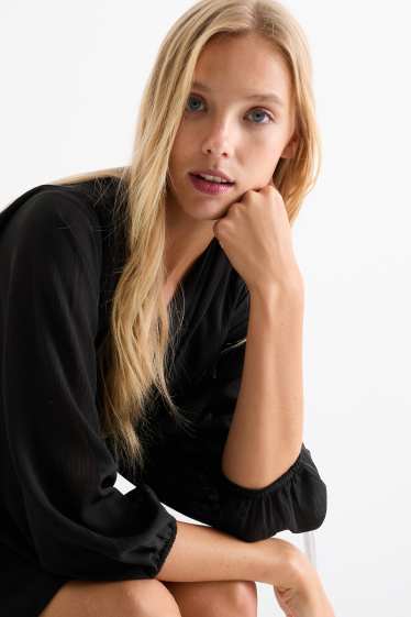 Women - V-neck chiffon dress - textured - black