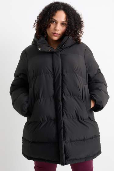 Dona - Jaqueta embuatada amb caputxa - resistent a l’aigua - negre