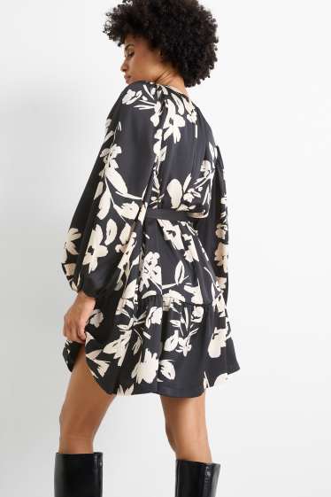 Dona - Vestit acampanat amb mànigues de fanal - de flors - negre