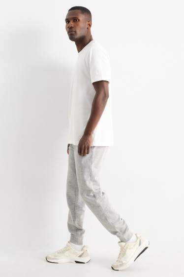 Bărbați - Pantaloni de trening - gri deschis melanj