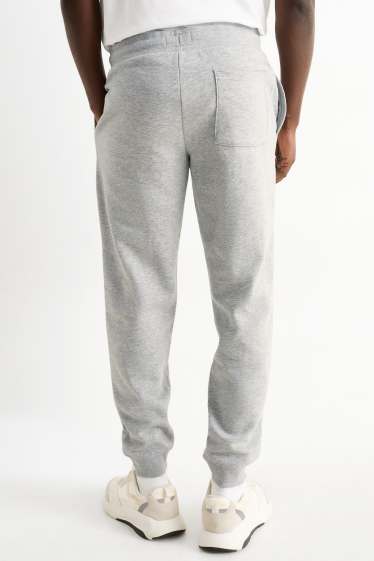 Bărbați - Pantaloni de trening - gri deschis melanj