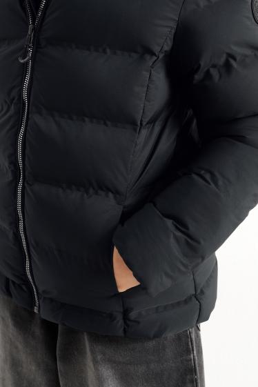 Kinder Mädchen - Steppjacke mit Kapuze - wasserabweisend - schwarz