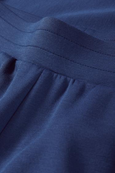 Dona - Pantalons de xandall  - blau fosc