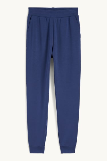 Dona - Pantalons de xandall  - blau fosc