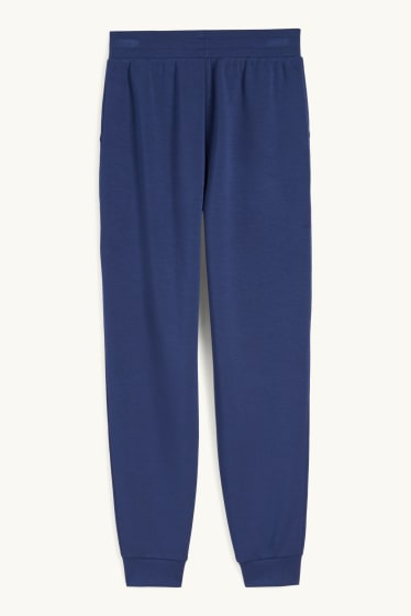 Dona - Pantalons de xandall  - blau fosc