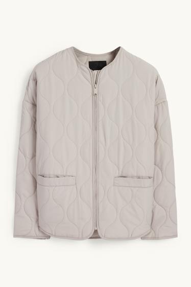 Women - Quilted jacket - light beige