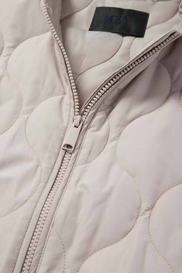 Women - Quilted jacket - light beige