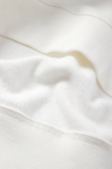 Home - Dessuadora oversized - blanc