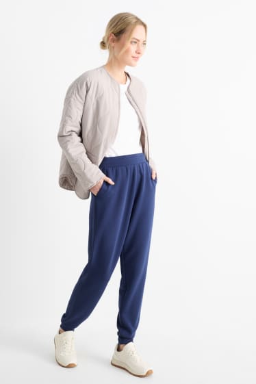 Dona - Pantalons de xandall  - blau fosc