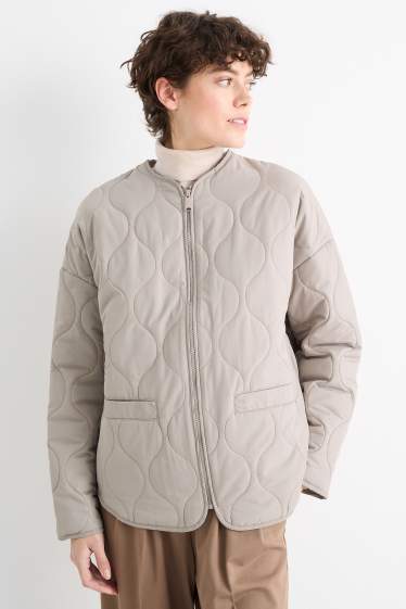 Women - Quilted jacket - light beige