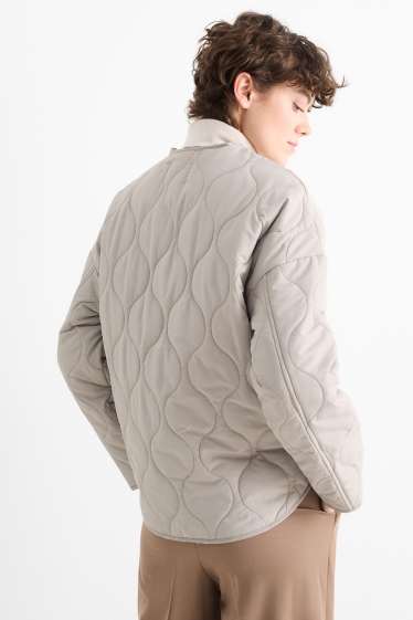 Women - Quilted jacket - light beige