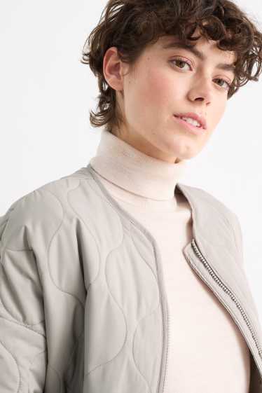 Women - Quilted jacket - light beige