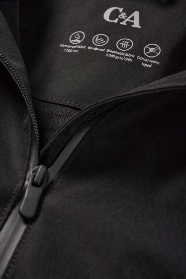 Femmes - Veste de pluie à capuche - imperméable - noir
