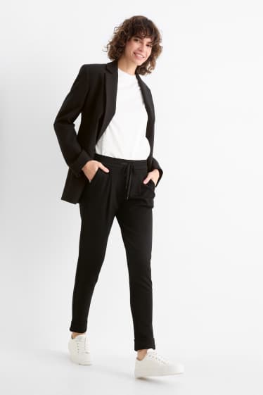 Donna - Pantaloni di jersey - vita media - tapered fit - nero