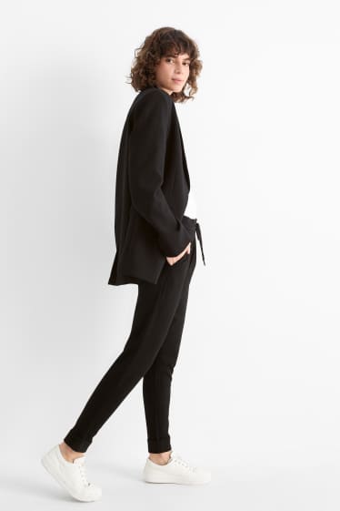 Donna - Pantaloni di jersey - vita media - tapered fit - nero