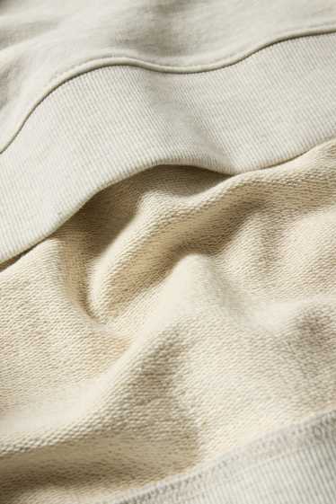 Home - Dessuadora amb caputxa - gris clar jaspiat