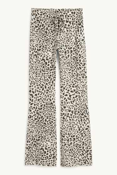 Damen - Flared Leggings - Leo-Print - schwarz / beige