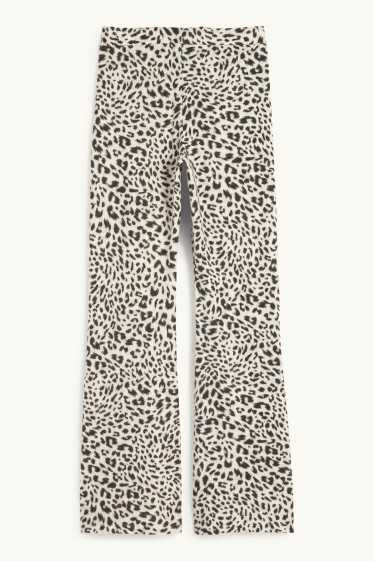 Damen - Flared Leggings - Leo-Print - schwarz / beige