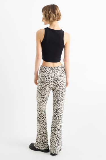 Damen - Flared Leggings - Leo-Print - schwarz / beige