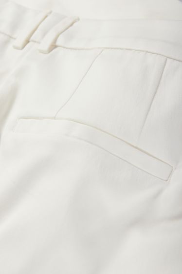 Femmes - Pantalon de toile - mid waist - tapered fit - blanc crème