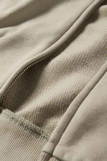 Home - Dessuadora oberta oversized amb caputxa - verd