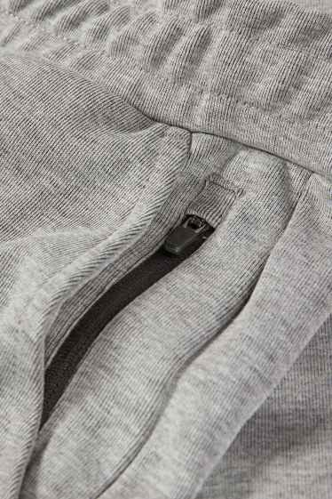 Uomo - Pantaloni sportivi tecnici - grigio chiaro