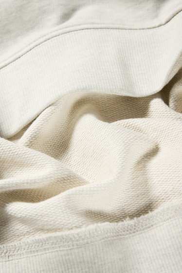 Home - Dessuadora amb caputxa - gris clar jaspiat